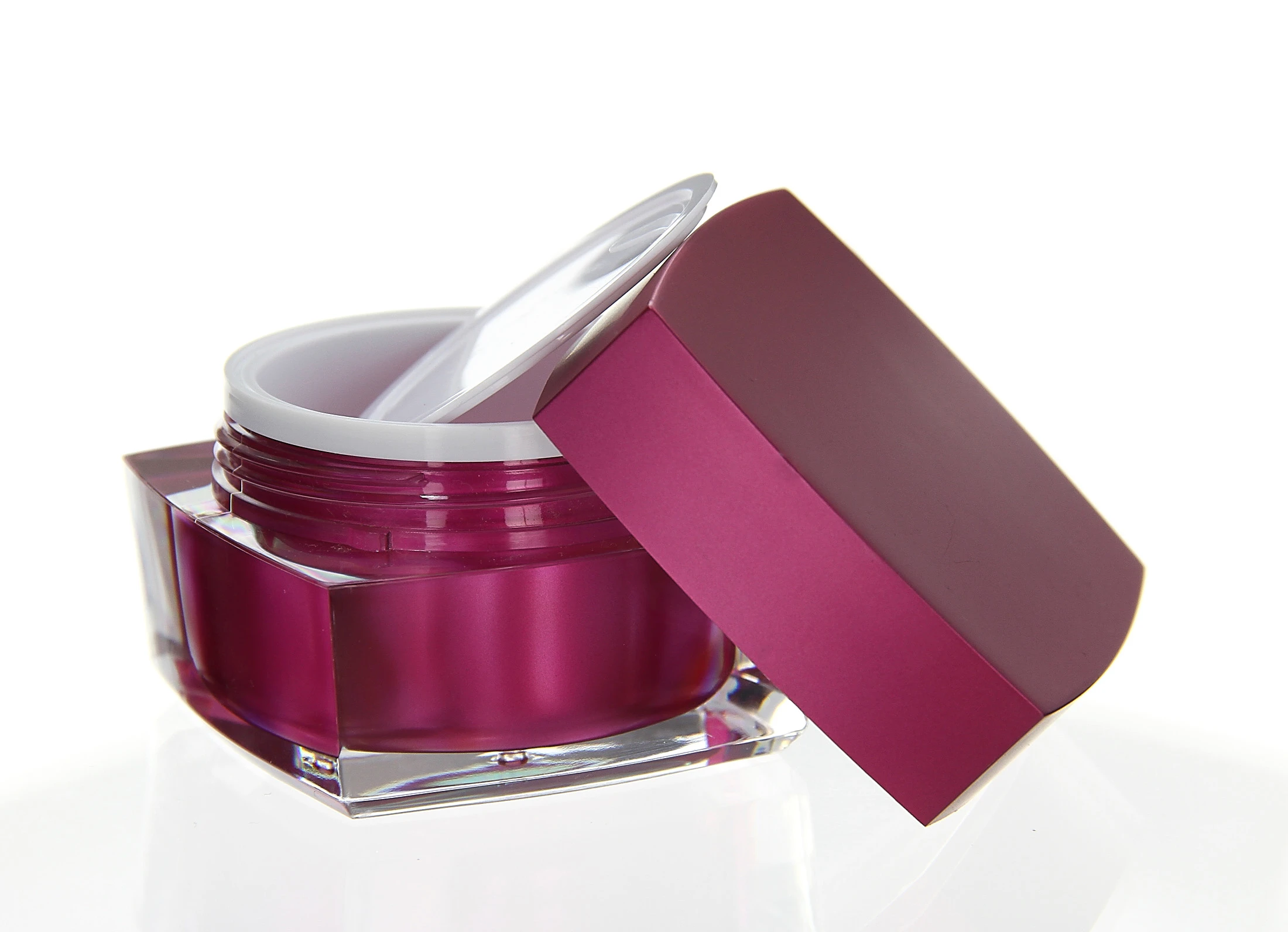 Open 50ml acrylic jar in glossy pink with white inner seal and transparent base on light background