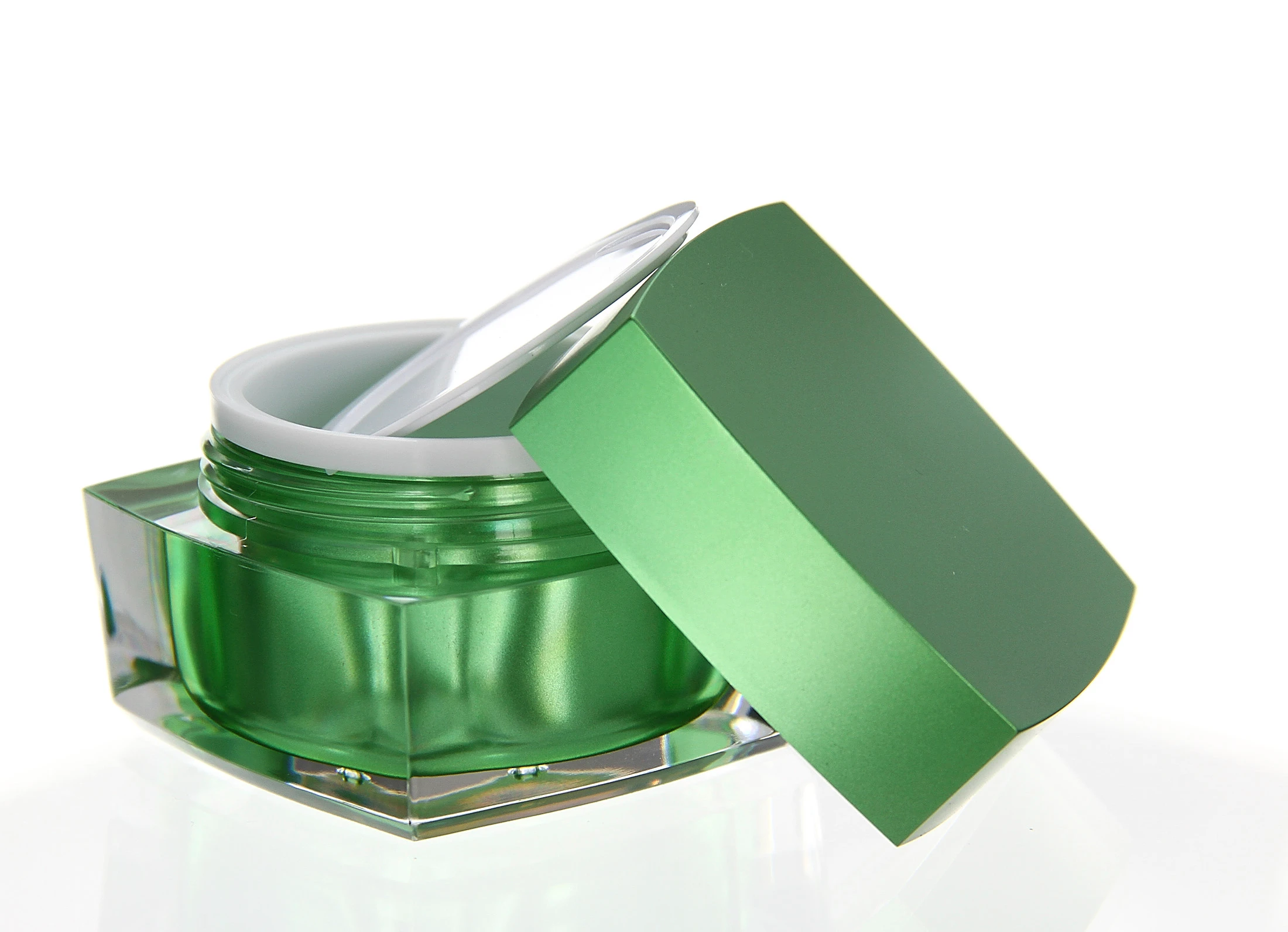 Open 50ml acrylic jar in glossy green with white inner seal and clear base on light background
