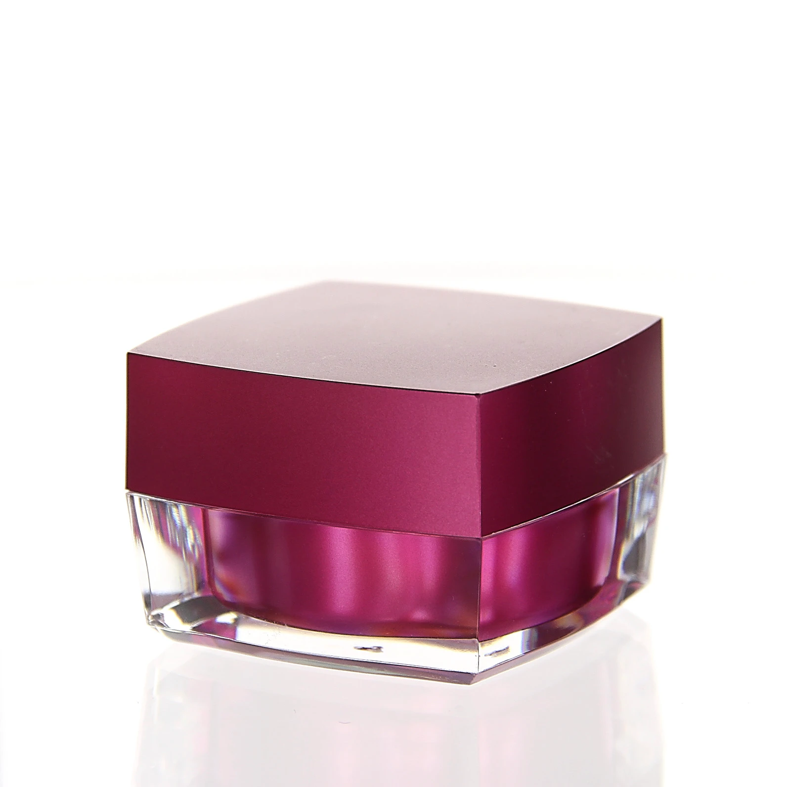 Glossy 15ml cosmetic jar in vibrant pink with clear acrylic outer shell on white background