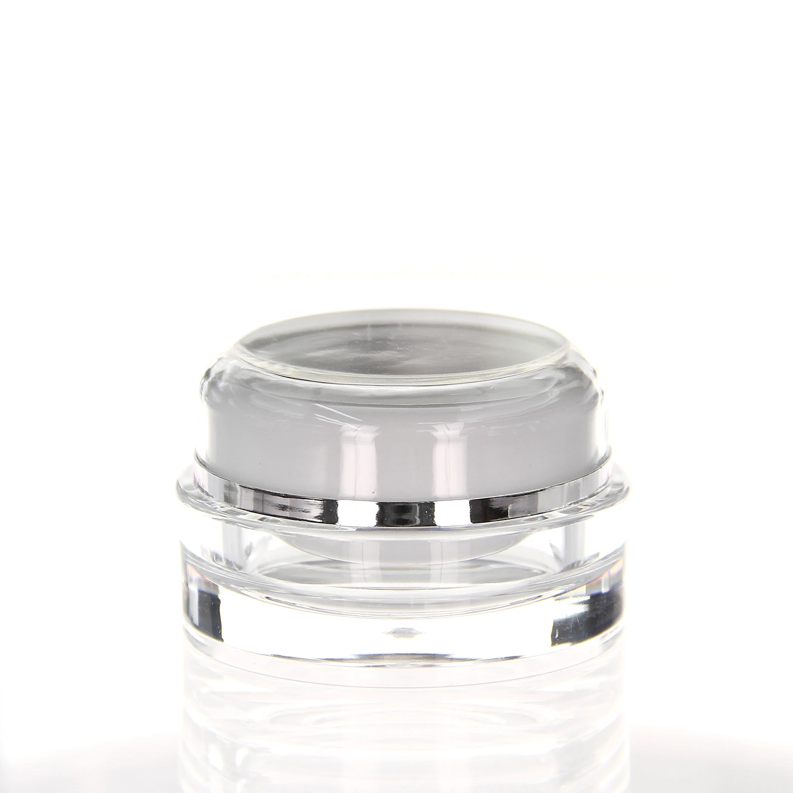 Closed 15ml acrylic jar with white inner container, clear outer wall and silver accent ring on white background