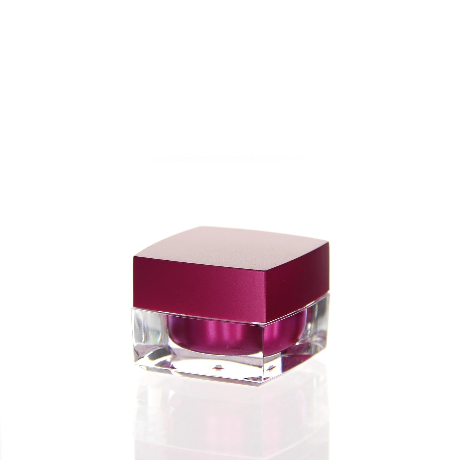Closed 5ml acrylic jar in glossy pink with transparent outer shell on white background