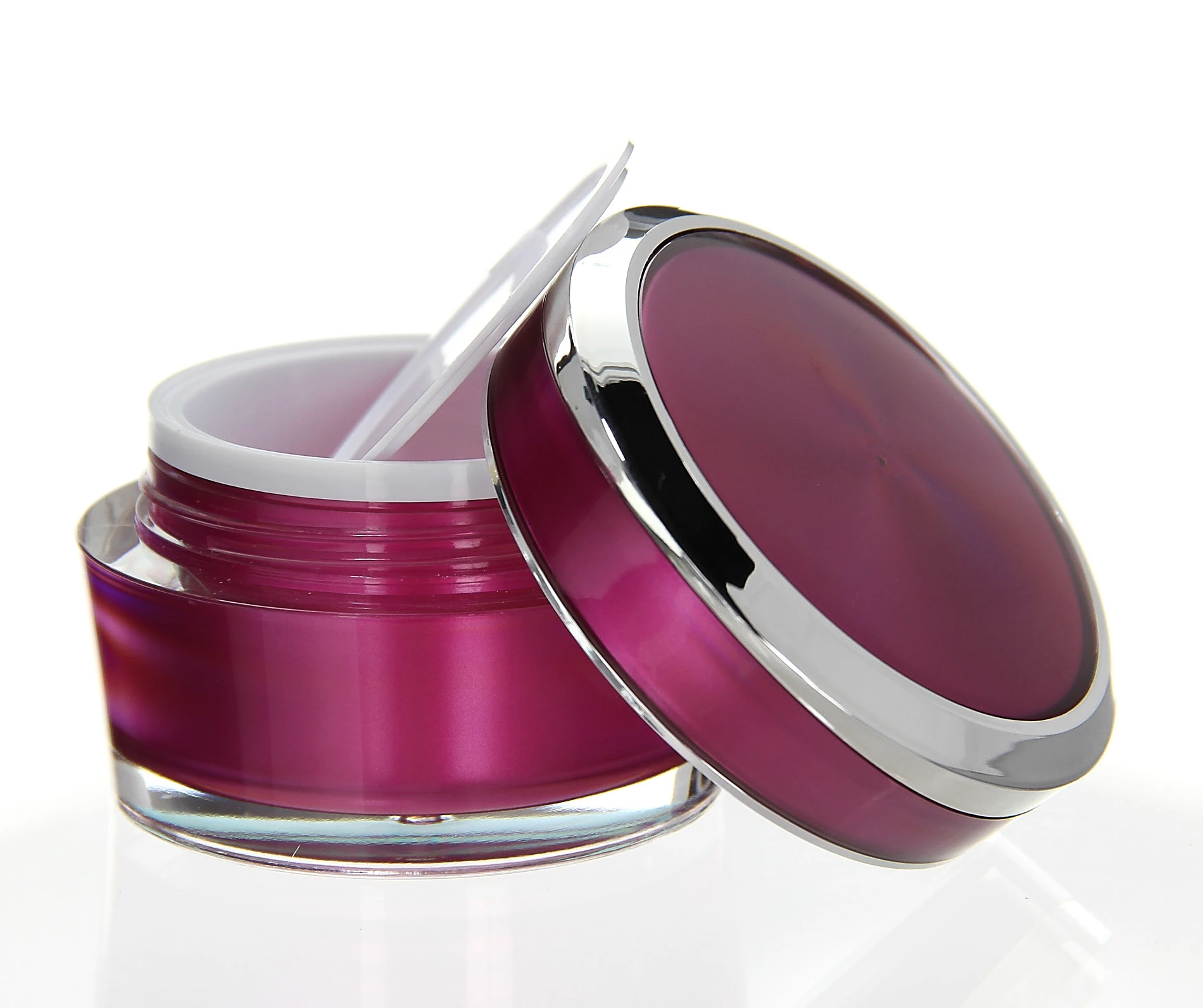 Open 50ml Mars acrylic jar in pink with silver lid and white inner seal on white surface