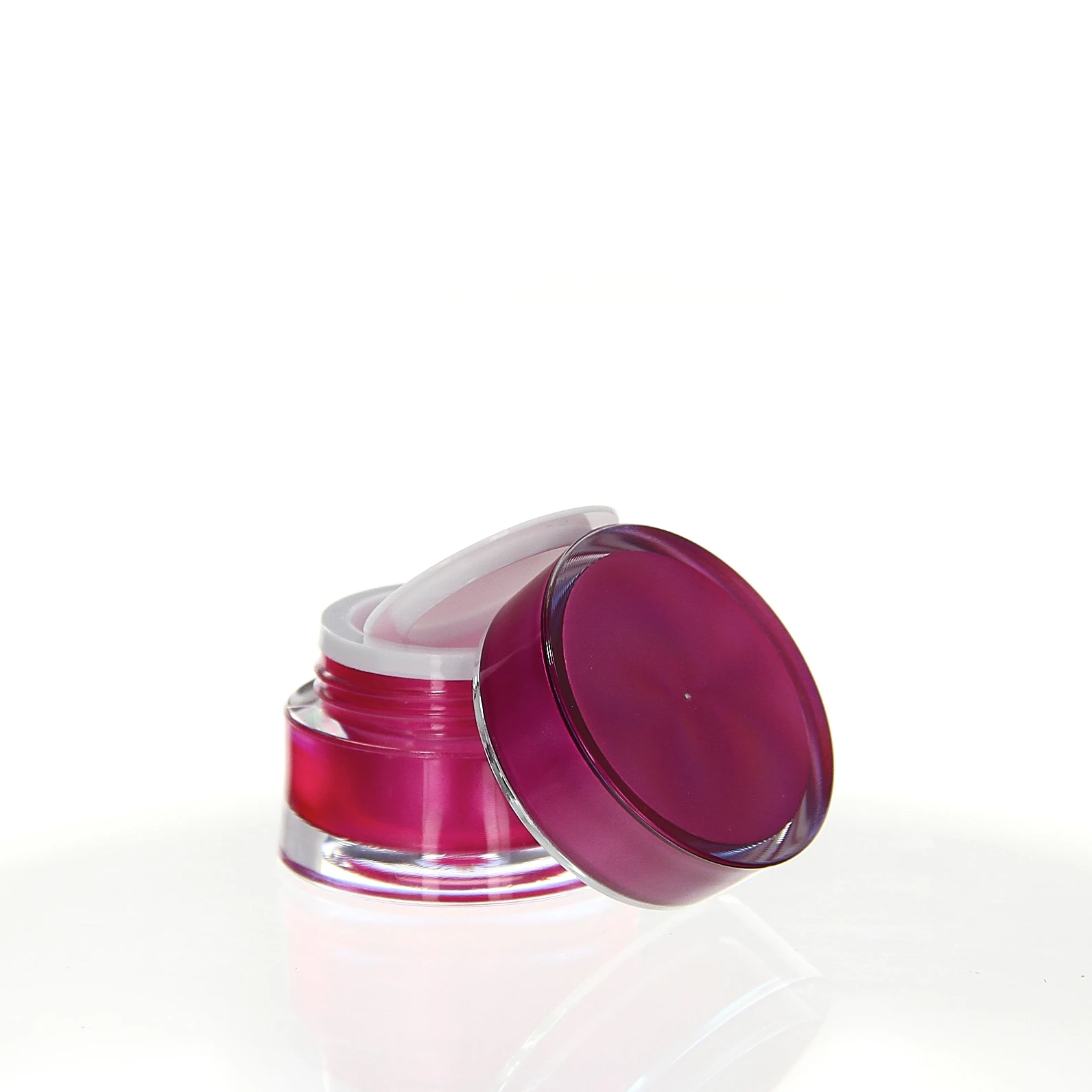 Opened 5ml Ocean acrylic jar in glossy pink with inner lid and cap on white background