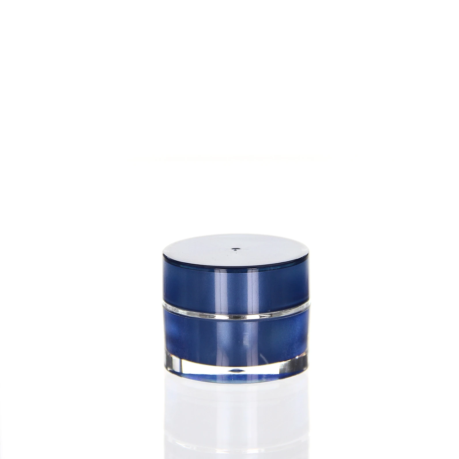 Geschlossene 5ml Acryldose in tiefem Blau mit glänzender Oberfläche und transparenter Außenwand