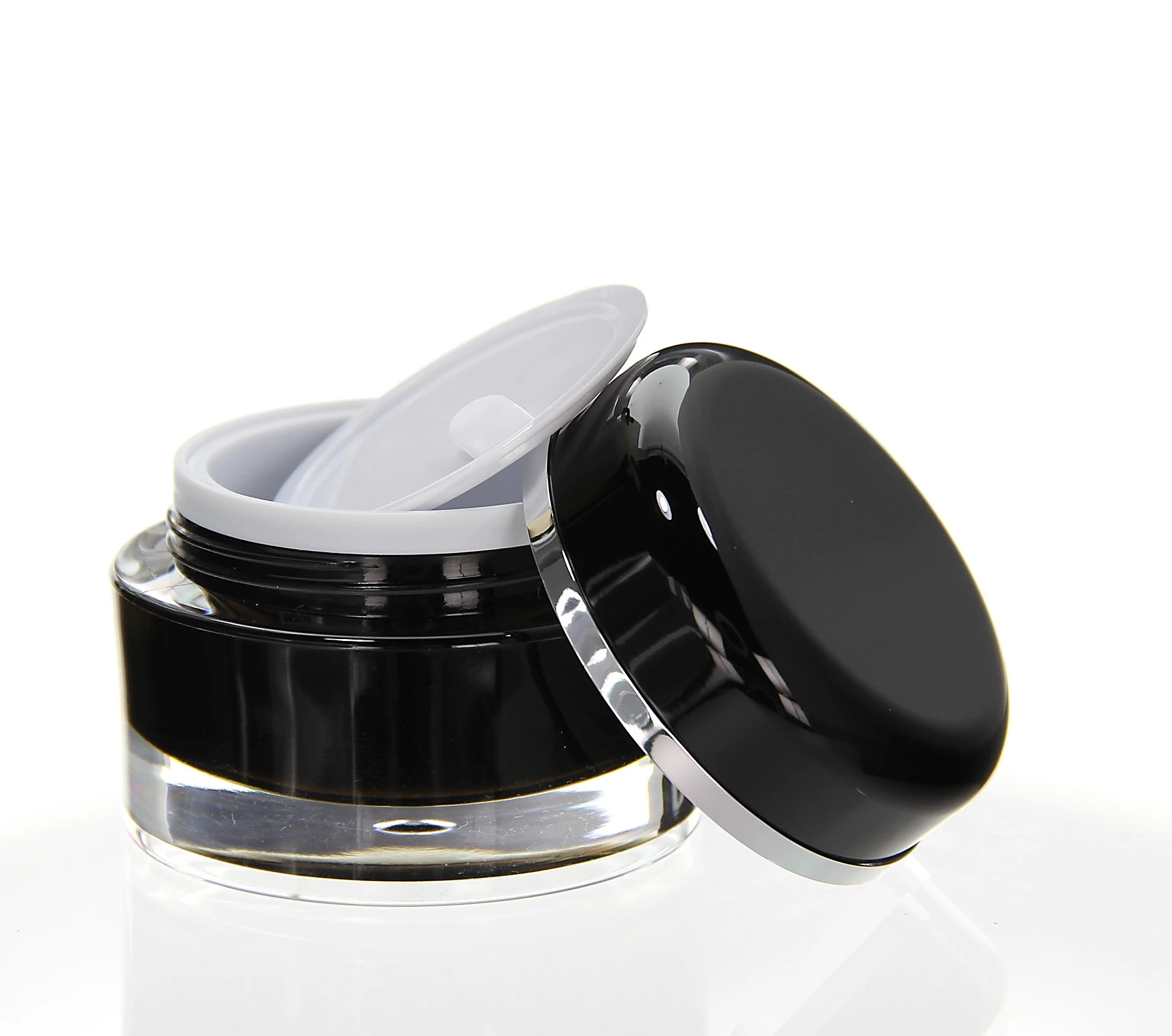 Opened 30ml black acrylic jar with glossy finish and protective inner lid