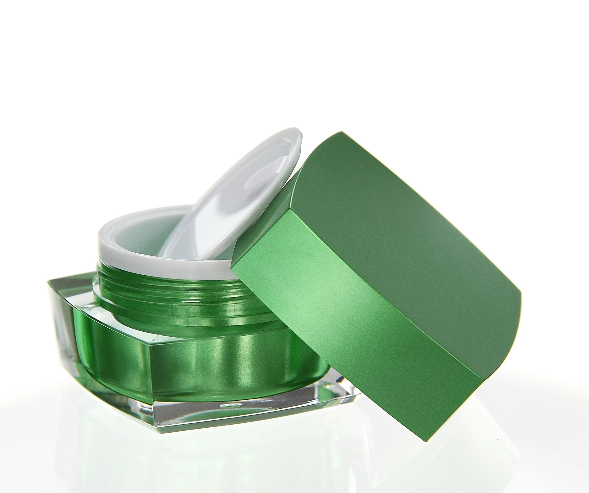 Open 15ml acrylic jar in glossy green with white inner seal and clear base on light background