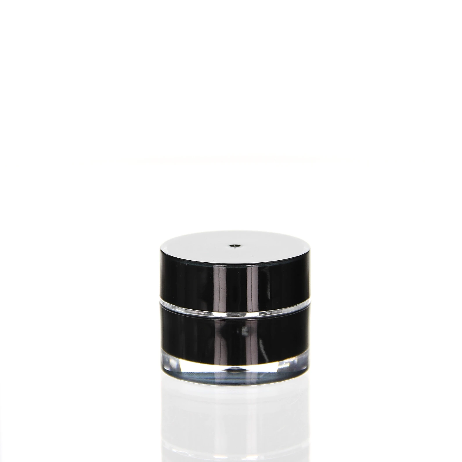 5ml black acrylic jar for luxury samples and skincare products Closed 5ml acrylic jar in glossy black with transparent outer wall on white pedestal