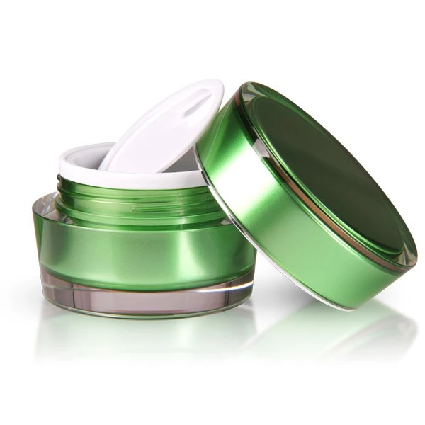 Opened 30ml acrylic jar in glossy green with lid and white sealing insert on white background