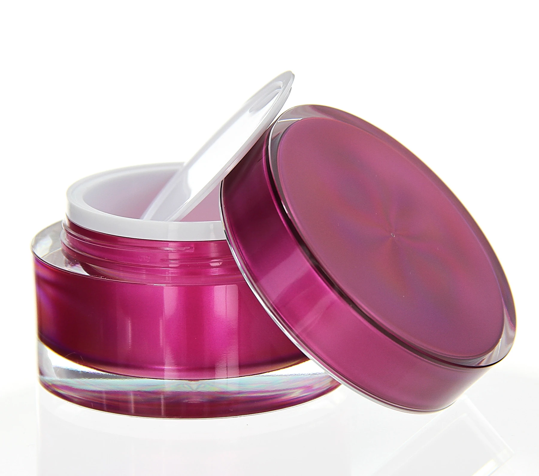 Open 50ml pink acrylic jar with white inner lid and clear outer shell on light background