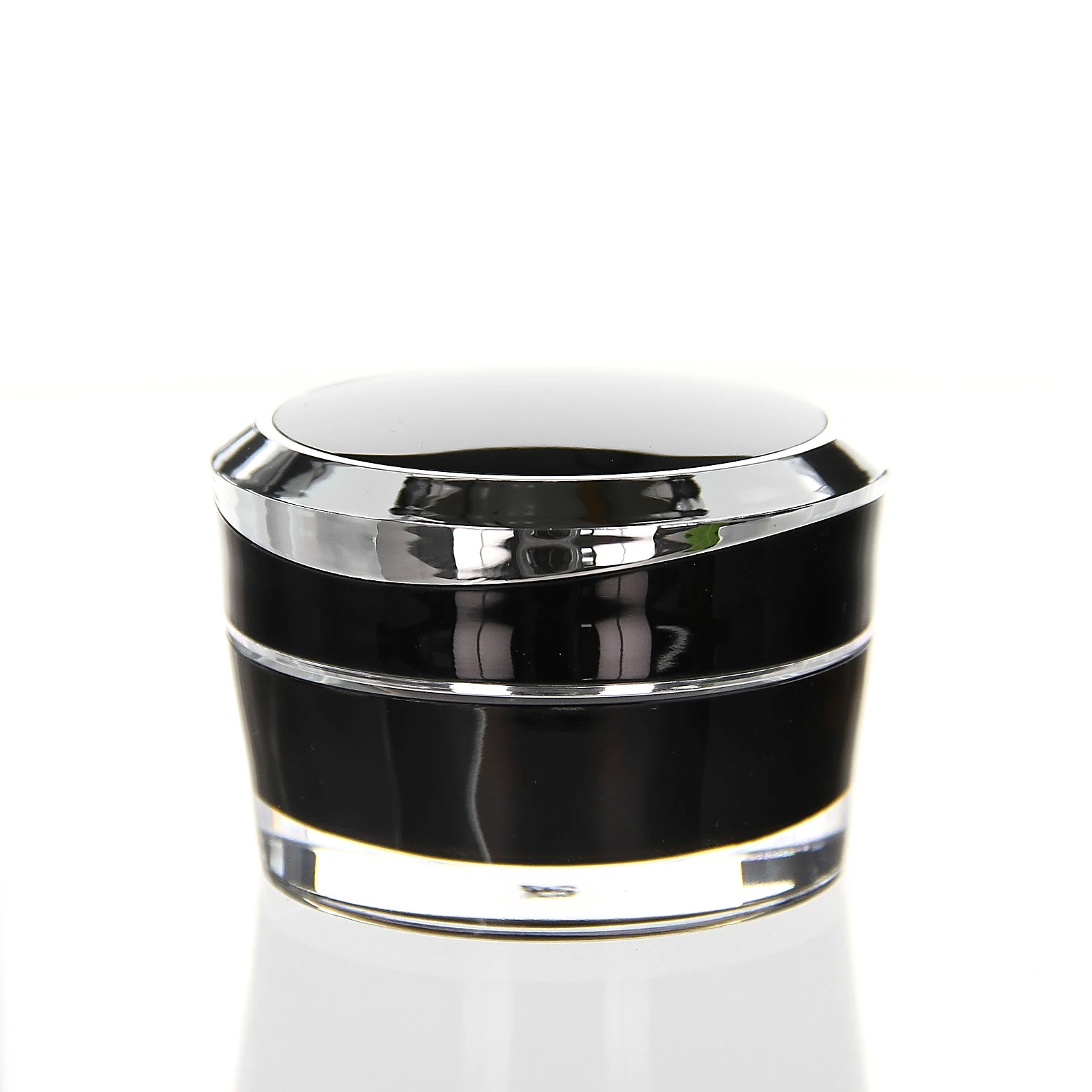 Closed 30ml Mars acrylic jar in black with glossy lid and silver accent on bright surface