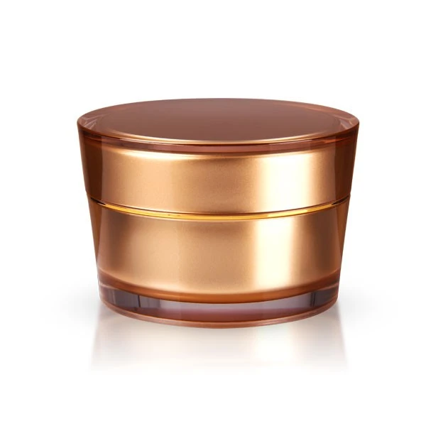 Closed 50ml acrylic jar in glossy gold with round shape on white background