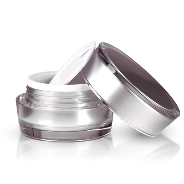 Open 15ml acrylic jar in glossy silver with white sealing disc on bright surface